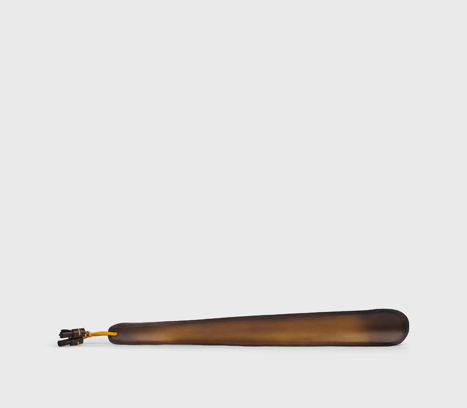 Large shoehorn in yellow leather