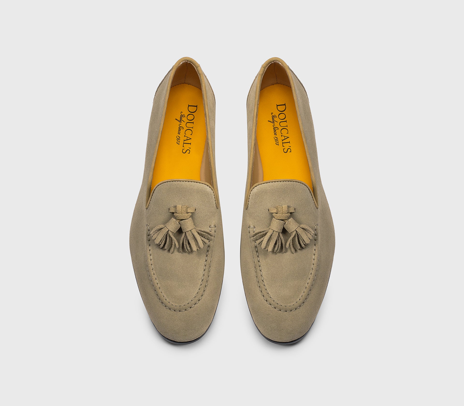 Camel-coloured suede loafer with tassels