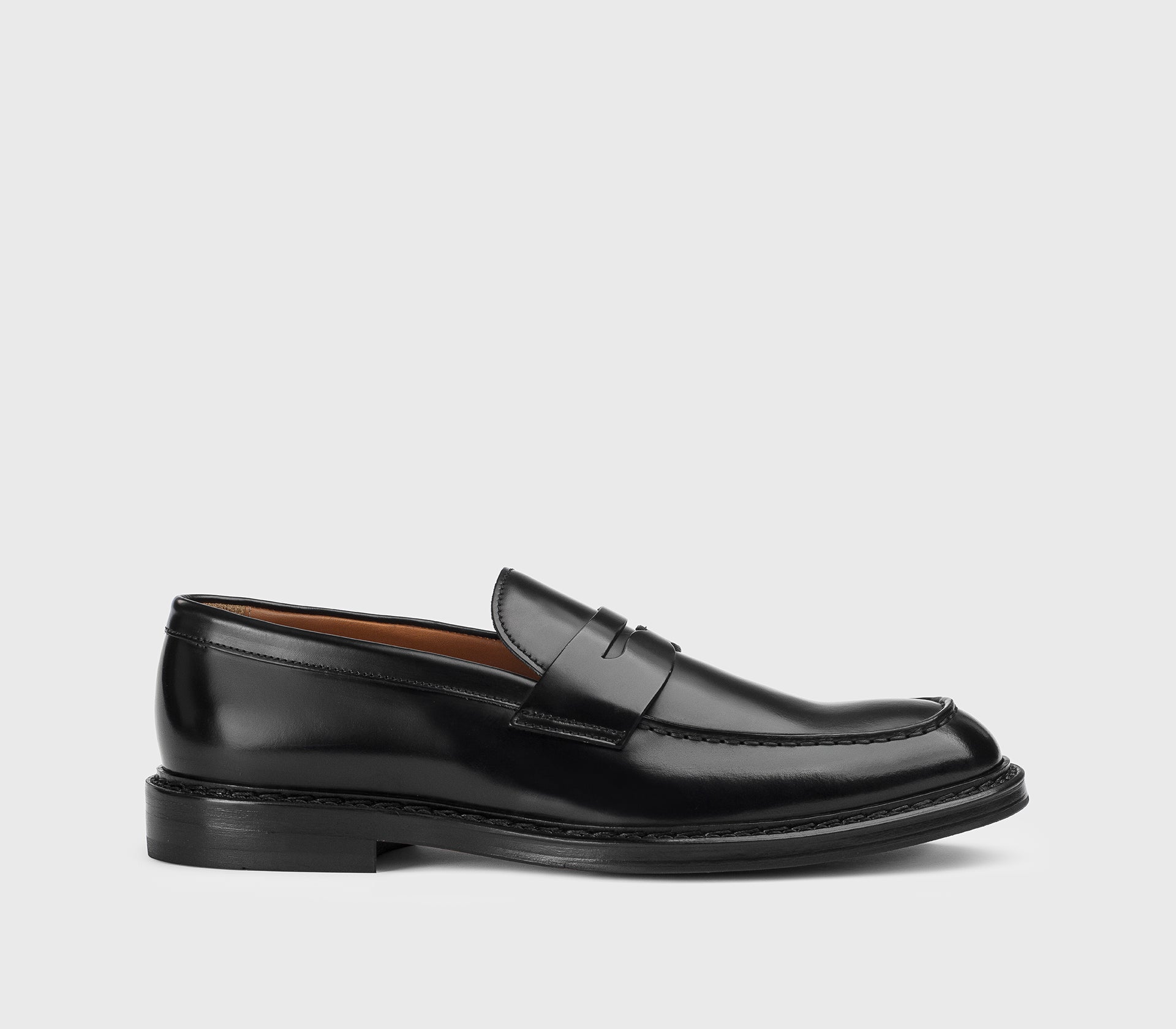 Black leather loafer.