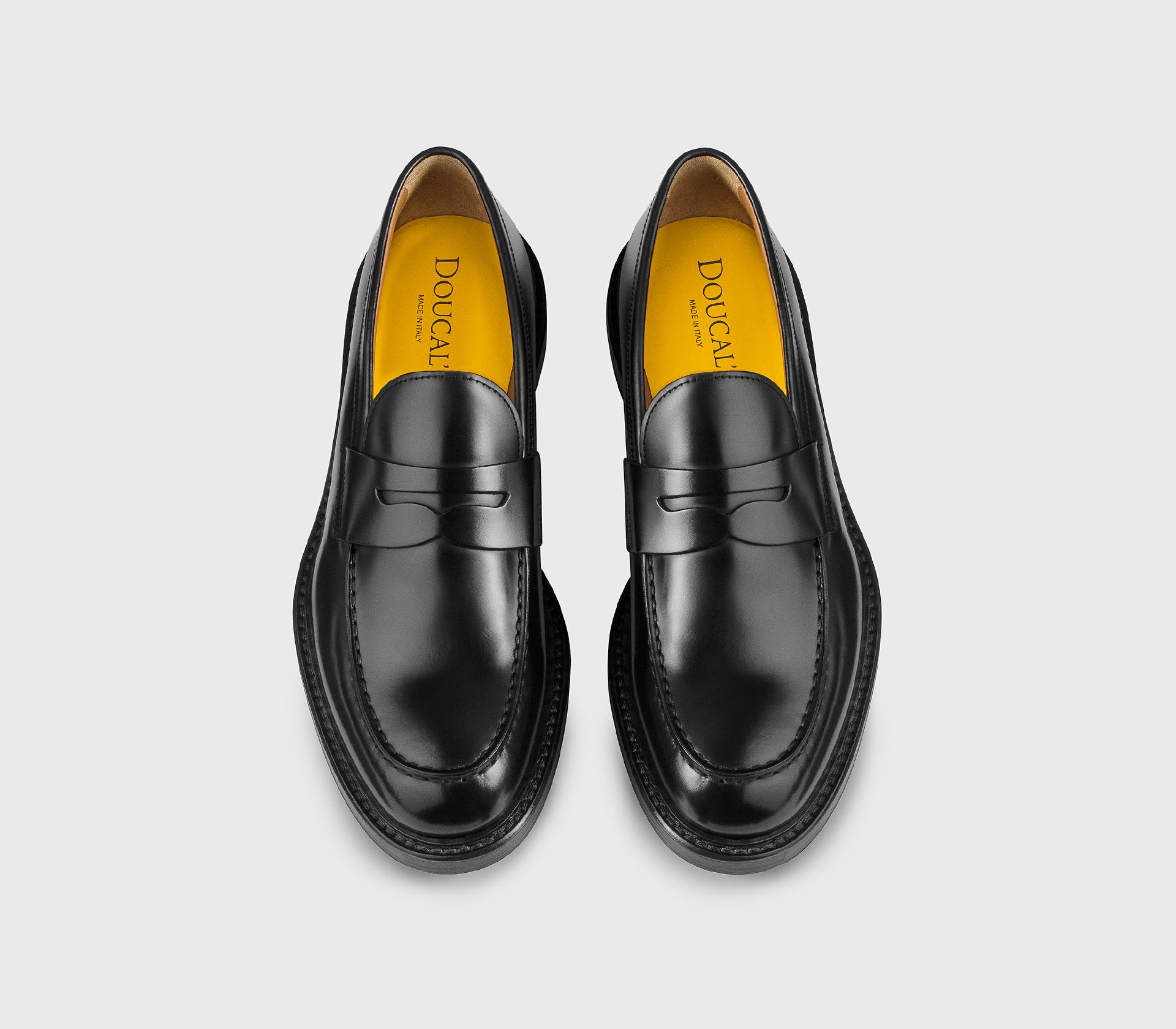 Black leather loafer.