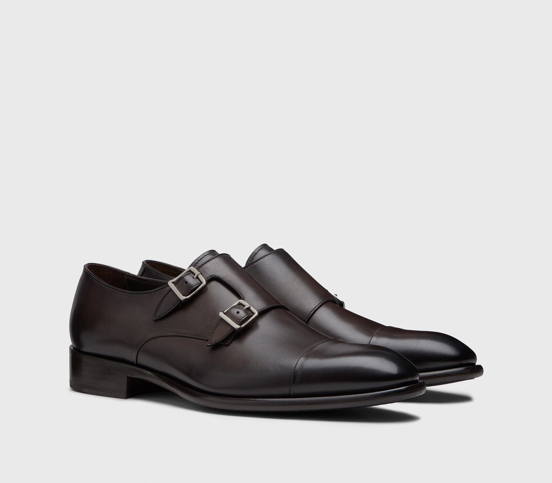 Dark brown leather double-buckle shoe