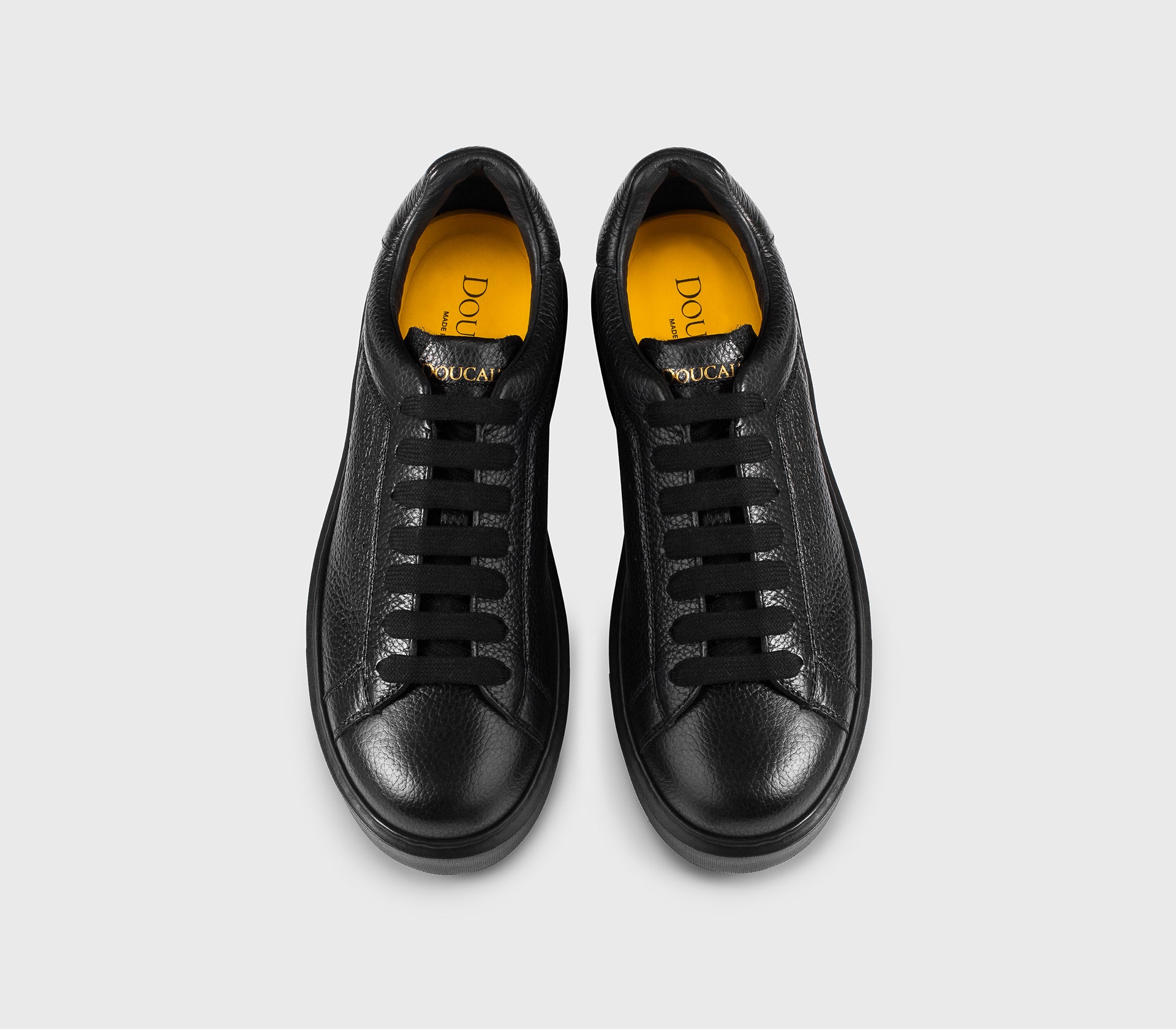 Black tumbled leather sneaker.