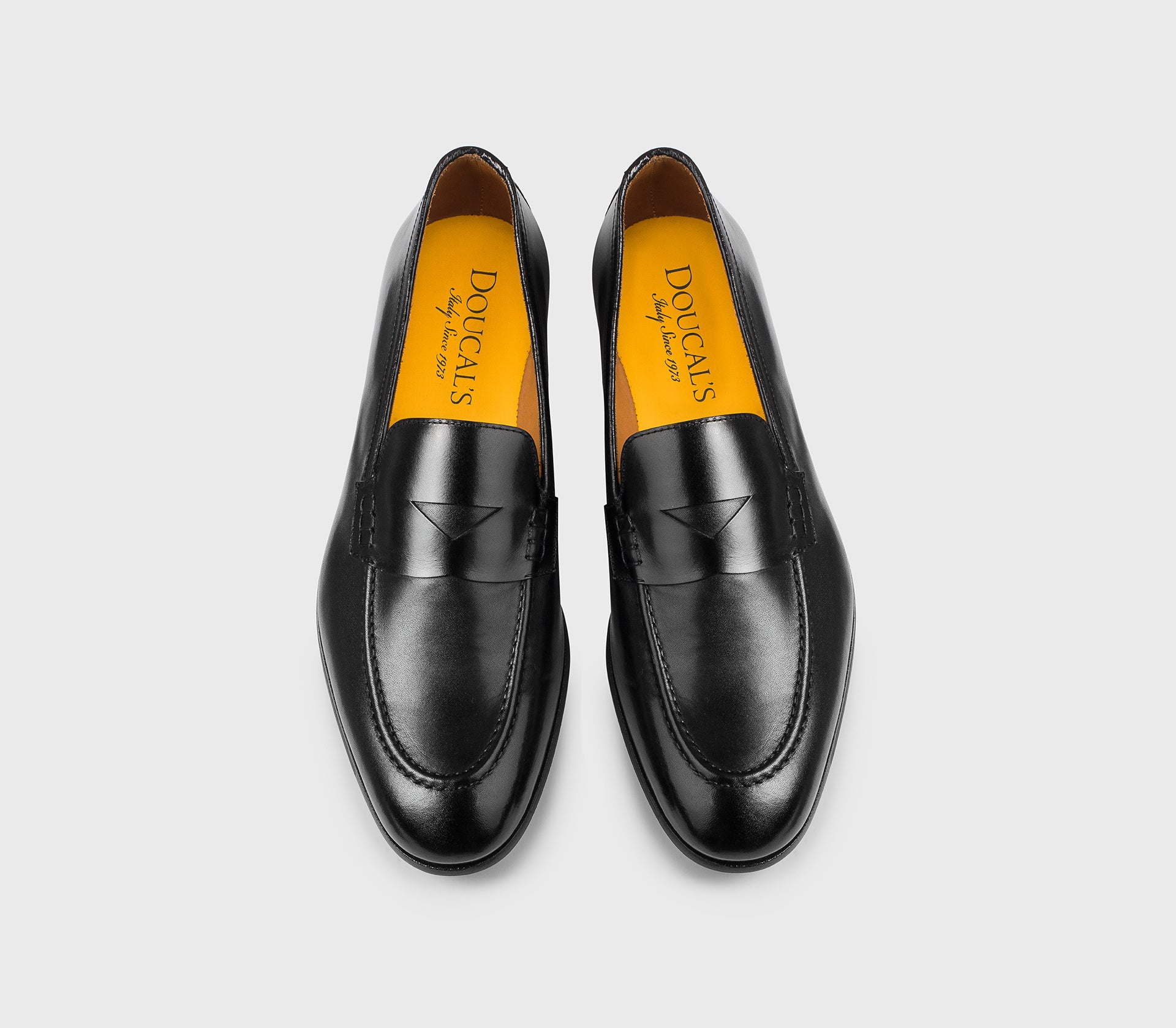 Black leather loafer.