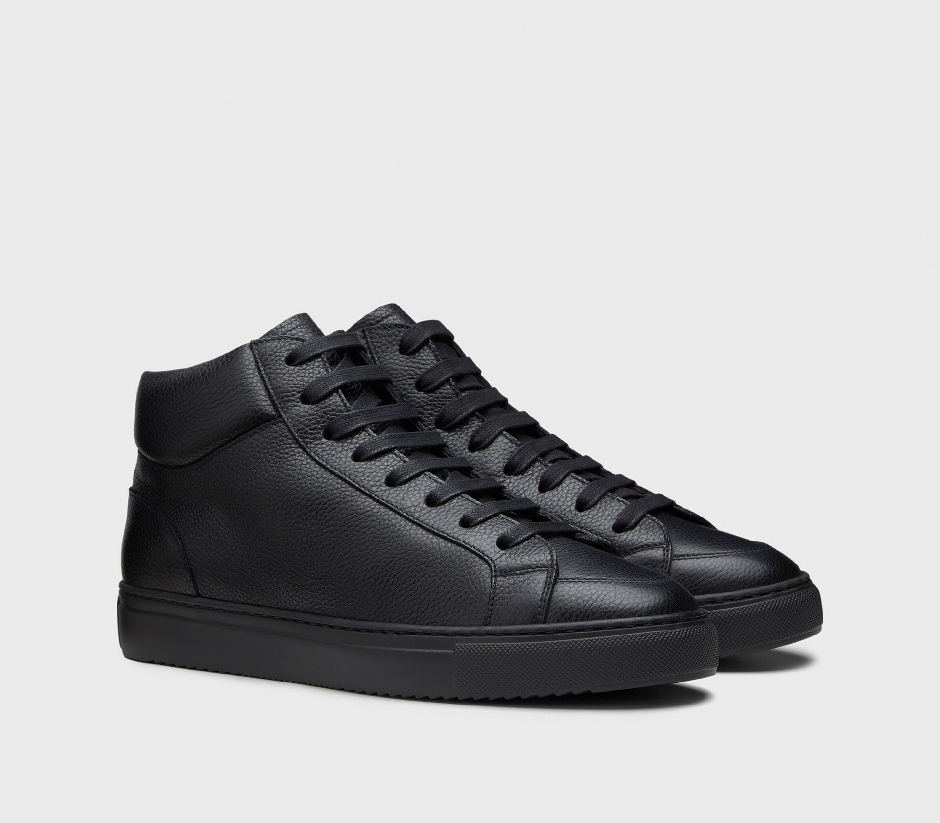 Black leather high-top sneaker with sheepskin lining