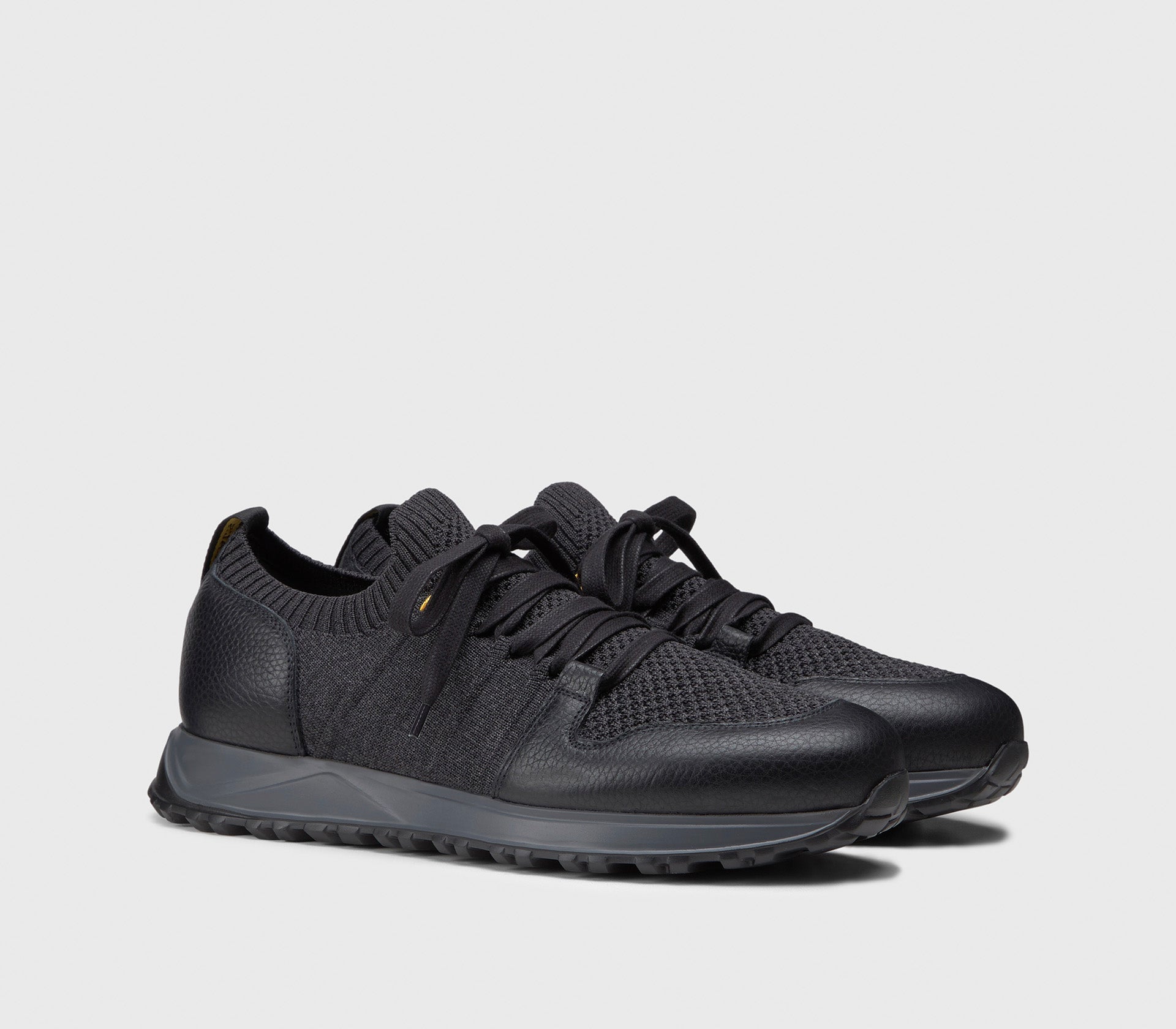 Technical fabric and black leather sneaker