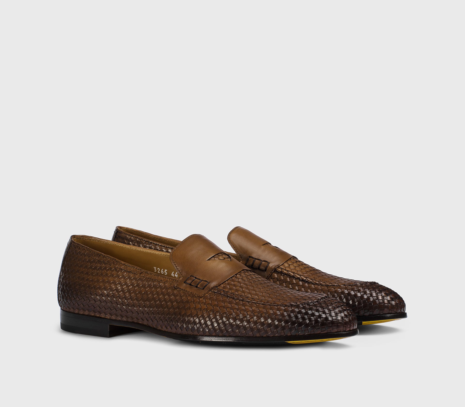 Tan-coloured woven leather loafer