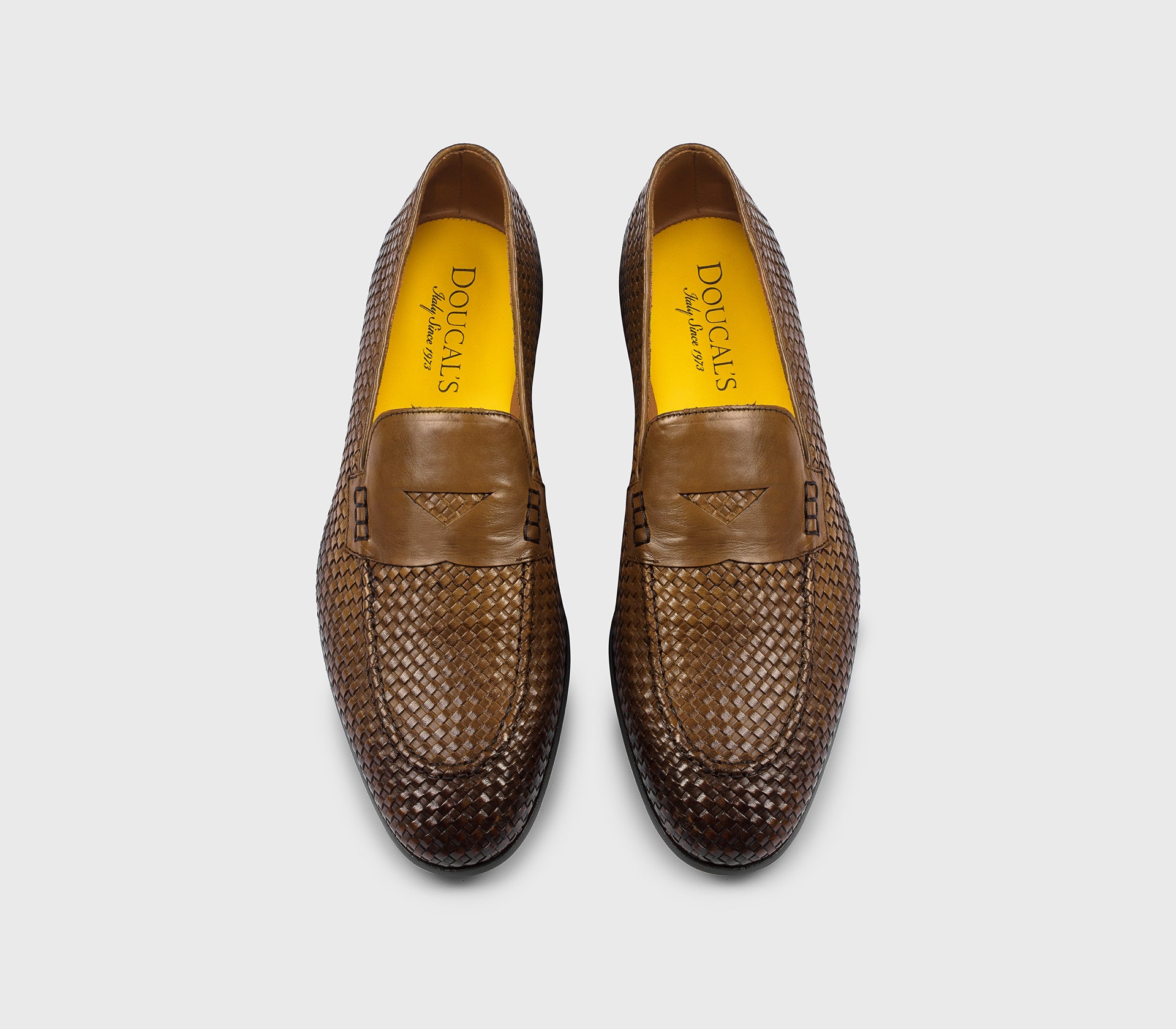 Tan-coloured woven leather loafer