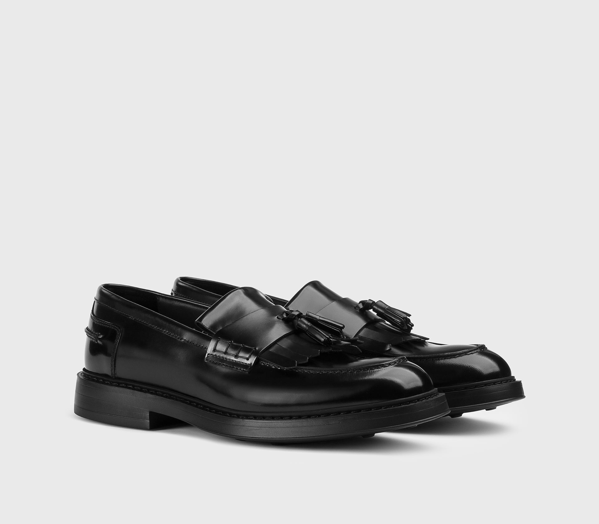 Black leather loafer.