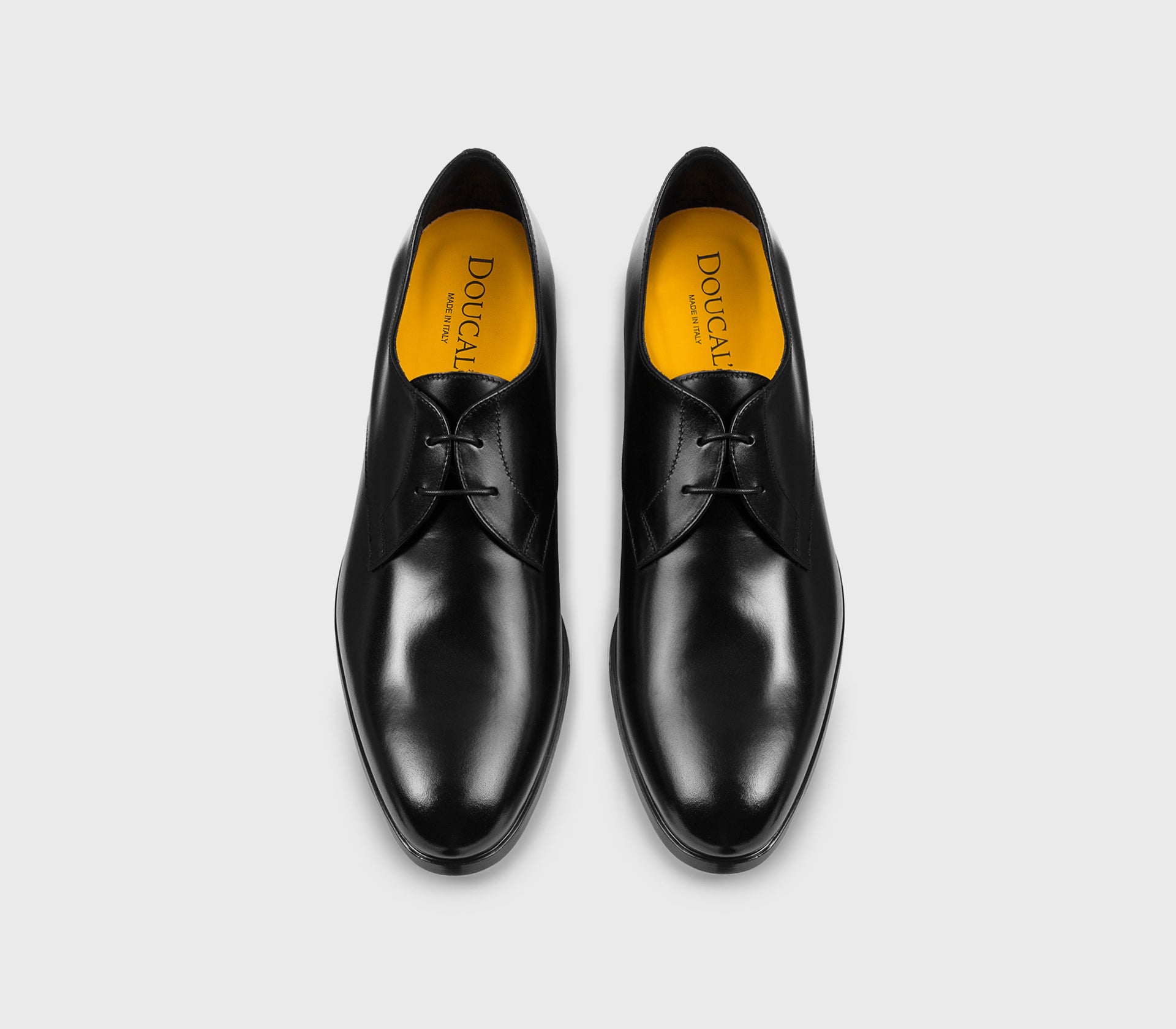 Black leather two-hole Derby lace-up