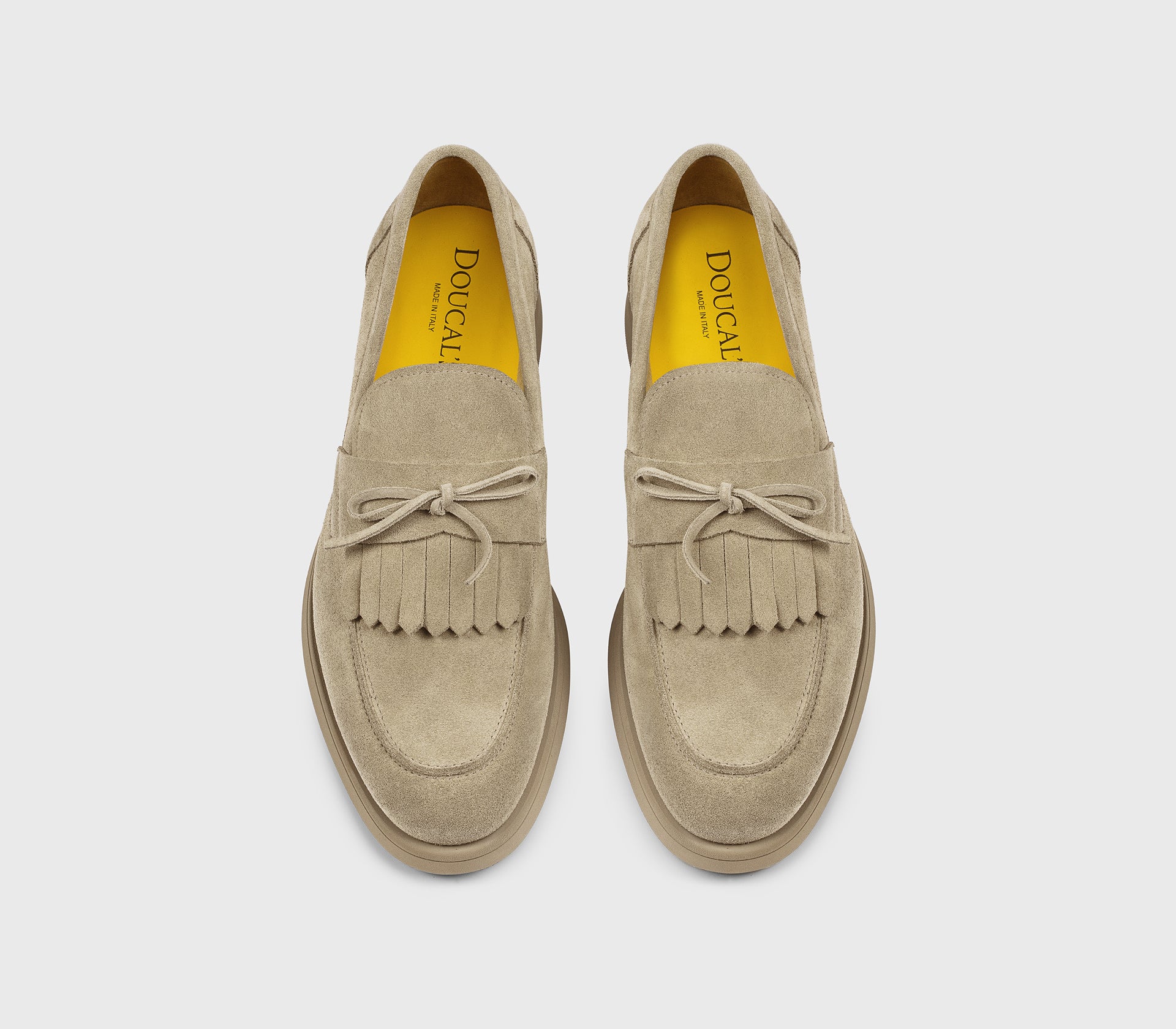 Sand-coloured suede loafer with fringe